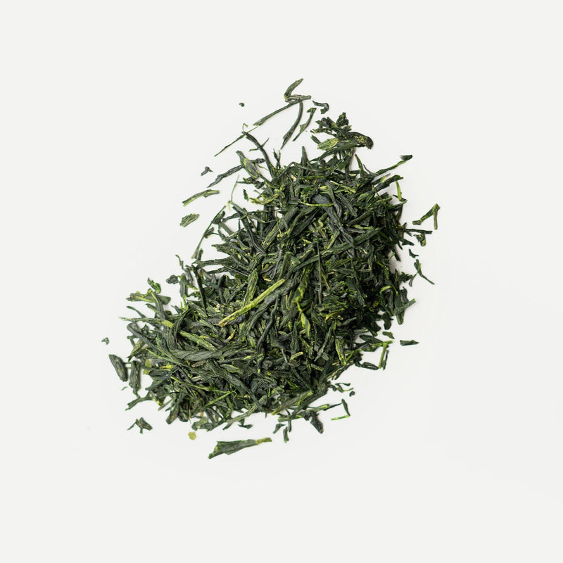 Loose-leaf Uji tea from Rishi Tea & Botanicals, featuring a rich umami aroma, displayed on a white background.